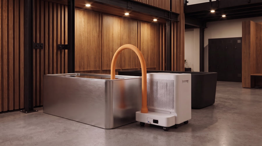 Norge N-03 in white beside a stainless commercial plunge in a studio with a timber slat wall
